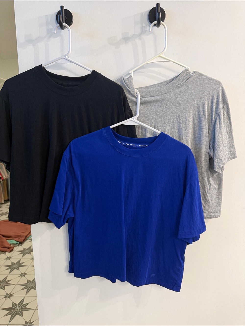 3 Fabletics cropped tees size medium. You get all of them